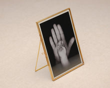 Load image into Gallery viewer, 5x7" Brass &amp; Glass Tabletop Photo Frame in Gold
