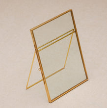 Load image into Gallery viewer, 5x7" Brass &amp; Glass Tabletop Photo Frame in Gold
